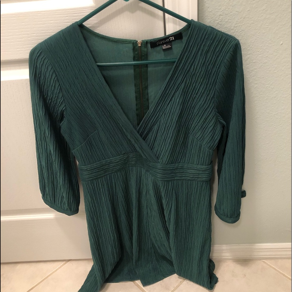 Beautiful blouse has a zipper in the back